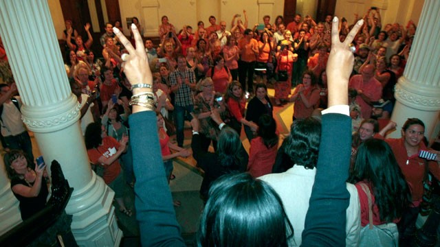 PHOTO: State Rep. Donna Dukes (D-Austin) gestures to reproductive rights advocates on June 25, 2013 in Austin, Texas. Lawmakers will meet for a special session in July when an anti-abortion bill will also be considered.