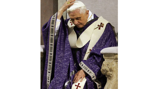 PHOTO: Pope Benedict XVI puts on his white cap during the mass for the liturgy of ashes at St. Sabina basilica in Rome, 01 March 2006