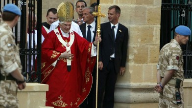 PHOTO: Pope Benedict XVI leaves Nicosia's Latin Church of the Holy Cross in the divided capital of Cyprus after celebrating mass on June 5, 2010