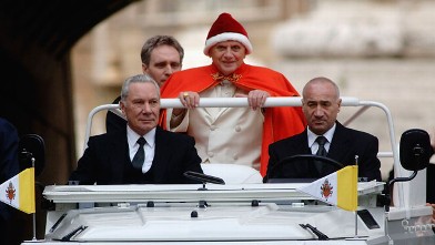 PHOTO: Pope Benedict XVI arrives in St. Peter's Square for his weekly audience on December 28, 2005 in Vatican City. The Pontif dressed for the second time in the red hat used by Pope John XXIII forty years ago.