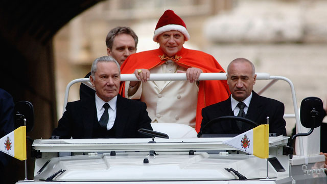 PHOTO: Pope Benedict XVI arrives in St. Peter's Square for his weekly audience on December 28, 2005 in Vatican City. The Pontif dressed for the second time in the red hat used by Pope John XXIII forty years ago.