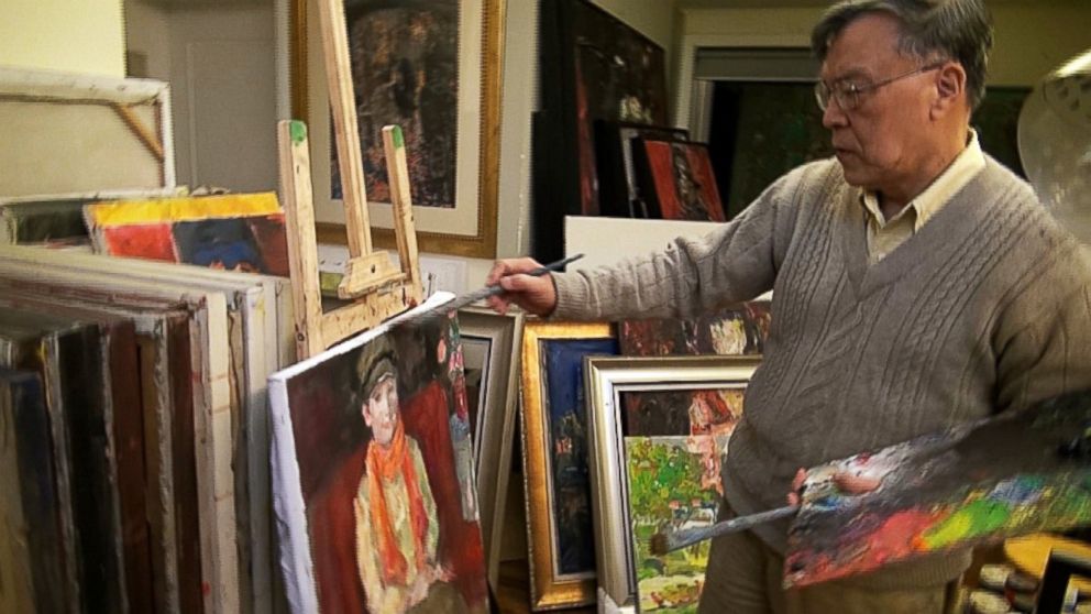 PHOTO: Artist Pei Shen Qian paints in his studio in China. Qian has been indicted in the U.S. for his alleged role in an art fraud scheme, but he claims he never knew his works would be sold as originals by other famous artists.