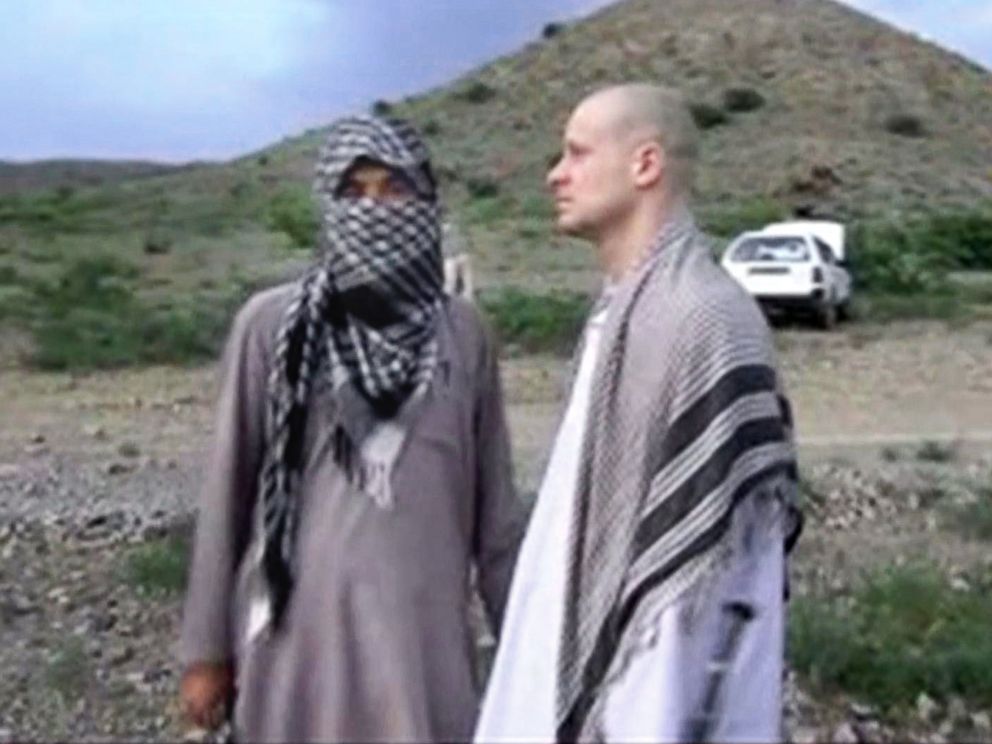 PHOTO: Sgt. Bowe Bergdahl, right, stands with a Taliban fighter in eastern Afghanistan, in this image taken from video obtained from Voice Of Jihad Website, which has been authenticated based on its contents and other AP reporting.