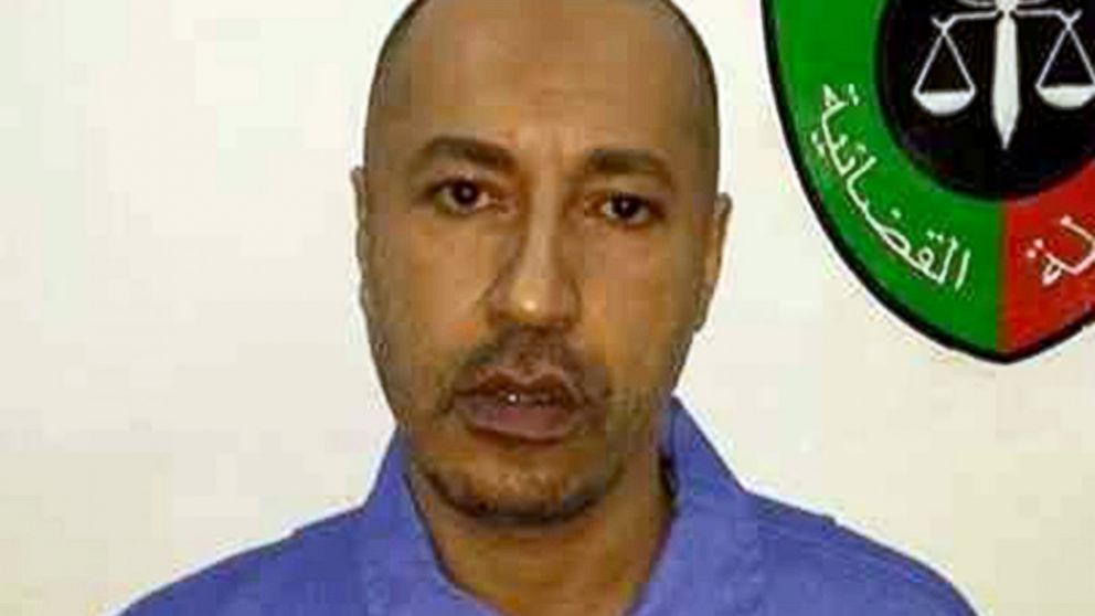 PHOTO: Saadi Gaddafi, son of ousted leader Muammar Gaddafi, is extradited from Niger and is transfered to prison in Tripoli, Libya, March 6, 2014.