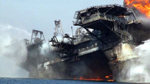 The Deepwater Horizon begins to list as it burns. The oil rig sank in the Gulf of Mexico on April 22, 2010.