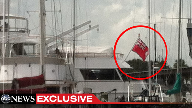 PHOTO: The yacht where elite donors of the Romney Victory Council are partying in Tampa flies a version of the Cayman Islands flag. Romneys use of offshore accounts for his investments has come under fire during the campaign.