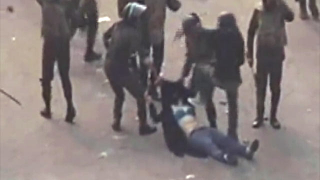 PHOTO: A womans hijab was torn and ripped off when she was dragged, kicked and beaten during protests in Egypt earlier this week, Dec. 21,2011.