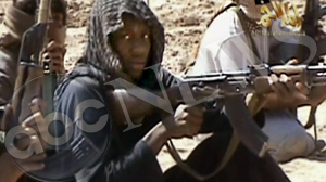 PHOTO A new video produced by al Qaeda in Yemen shows the accused underwear bomber Umar Farouk Abdulmutallab and others in his training class firing weapons at a desert camp.