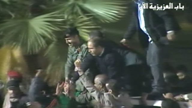 PHOTO A video shown on Libyan State television purports to show one of Moammar Kadhafis sons who was rumored to have been killed a week earlier.