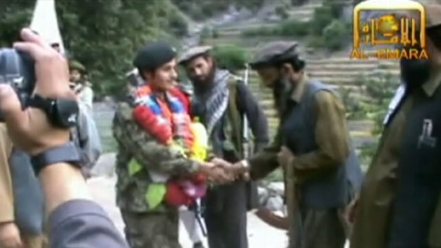 VIDEO: Taliban releases video of rogue ANA soldier as he's congratulated by Taliban commanders.