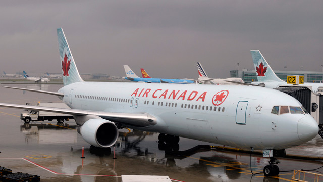 PHOTO: A Boeing 767 (767-300-ER) jetliner belonging to Air Canada at the Pearson Airport terminal gate in Toronto, Ontario is seen in this undated file photo.