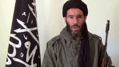 PHOTO: Militia leader Moktar Belmoktar, is seen from a video clip, announcing the capture of 41 foreigners from the Ain Amenas gas plant in Algeria, Jan. 16, 2013.