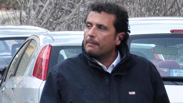 PHOTO: Francesco Schettino, the captain of the luxury cruiser Costa Concordia, which ran aground off Italy's Tuscan tiny island of Isola del Giglio, is taken into custody by Carabinieri in Porto Santo Stefano, Italy, Jan. 14, 2012.