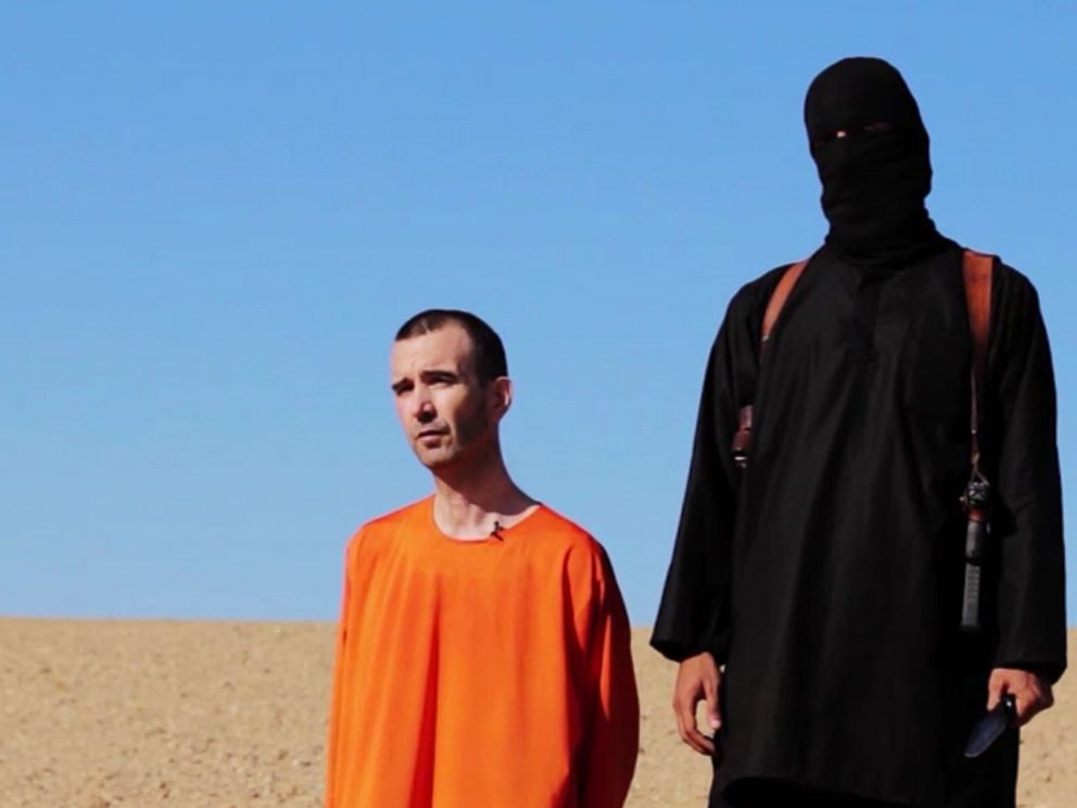 PHOTO: British citizen David Haines makes a statement to the camera in a video released online Sept. 13, 2014, that purports to show an ISIS militant executing him.