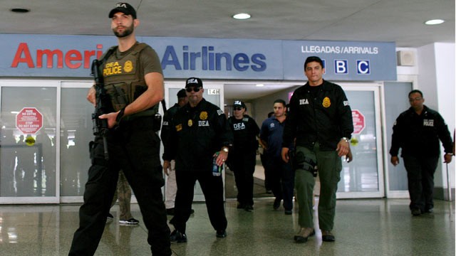 PHOTO: U.S. federal agents say they raided Puerto Rico's international airport and other areas early on June 6, 2012, arresting at least 33 people suspected of smuggling millions of dollars' worth of drugs aboard commercial flights.