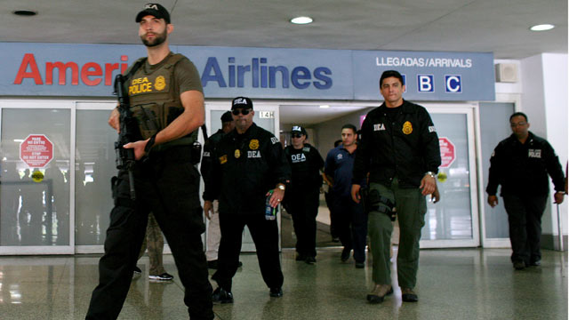 PHOTO: U.S. federal agents say they raided Puerto Ricos international airport and other areas early on June 6, 2012, arresting at least 33 people suspected of smuggling millions of dollars worth of drugs aboard commercial flights.
