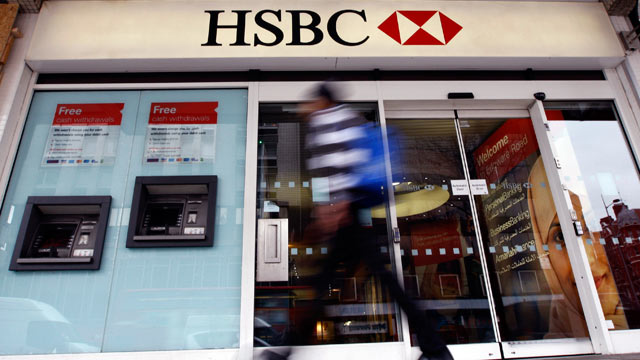 PHOTO: This is a Feb. 27, 2012 file photo of a pedestrian passes a branch of HSBC bank in London; HSBC avoided a legal battle that could further savage its reputation and undermine confidence in the global banking system by agreeing on Dec. 11, 2012 to p