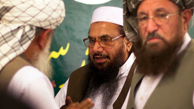 PHOTO: Hafiz Mohammad Saeed, center, talks with religious leaders prior to his news conference in Rawalpindi, Pakistan, April 4, 2012.