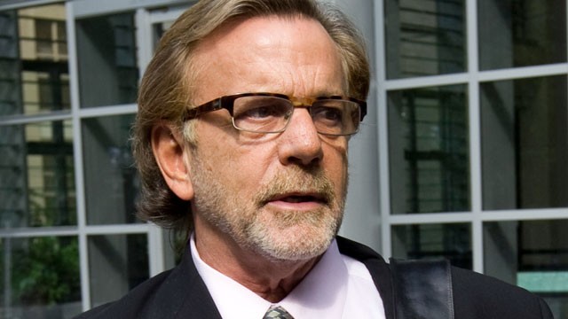 PHOTO: In this June 9, 2011 photo, attorney John Henry Browne answers questions from the media outside U.S. District Court in Seattle.