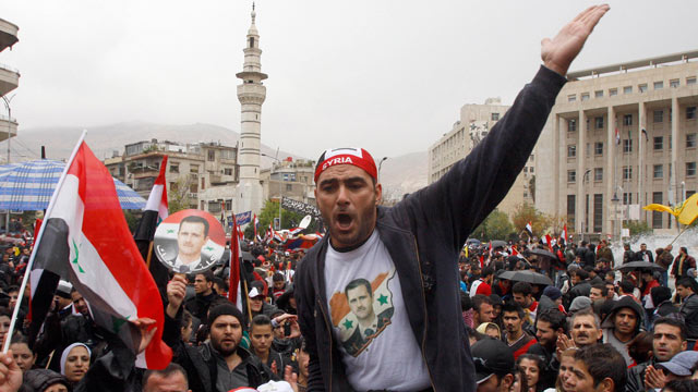 PHOTO: A pro-Syrian regime protester, shouts pro-Syrian President Bashar Assad slogans during a demonstration, Damascus, during a demonstration against the Arab League meeting being held in Morocco, Syria, Nov. 16, 2011.