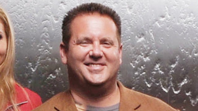 PHOTO: Attorney Scott W. Rothstein, holds one of his personal guitars as he poses for a portrait, Ft. Lauderdale, Florida, Aug. 8, 2009.