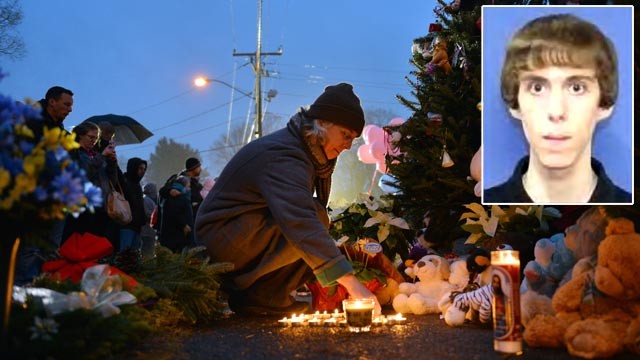 PHOTO: Candles are lit at a memorial near the Newtown Firehouse, Dec. 16, 2012, in Newtown, Conn.