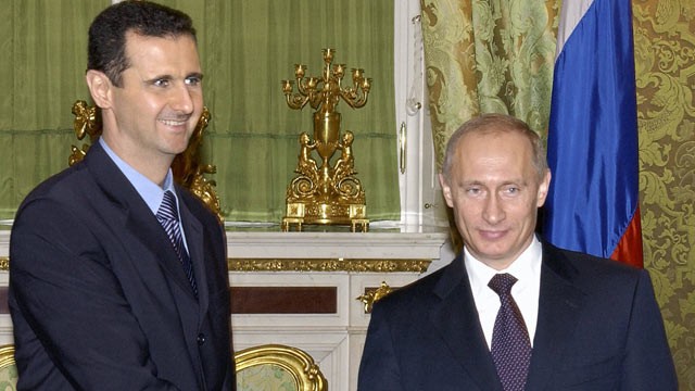 PHOTO: Russian President Vladimir Putin (R) shakes hands with his Syrian counterpart Bashar al-Assad during their meeting in Moscow, Jan. 25, 2005.