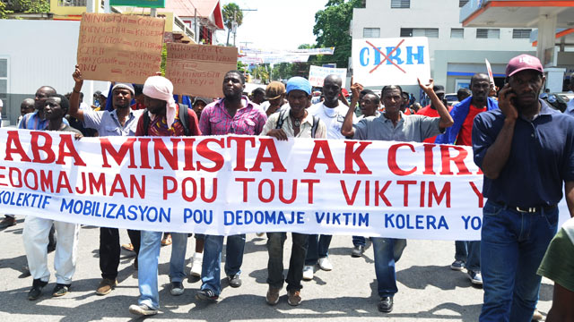 PHOTO: Haitians demonstrate in Port-au-Prince against the UN mission in Haiti and blame UN Peacekeepers of a cholera outbreak that began in 2010, Sept. 23, 2011.