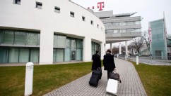 PHOTO: Visitors arrive at the headquarters of Deutsche Telekom AG in Bonn, Germany, Feb. 28, 2013.
