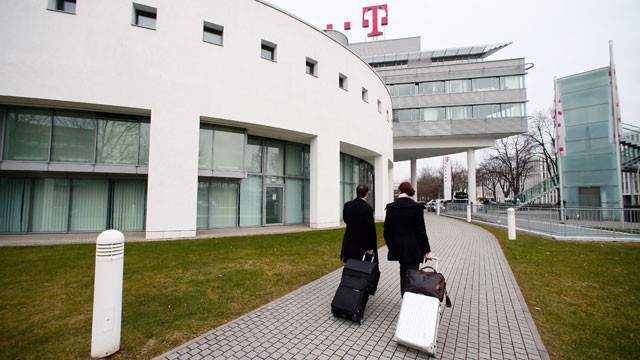 PHOTO: Visitors arrive at the headquarters of Deutsche Telekom AG in Bonn, Germany, Feb. 28, 2013.