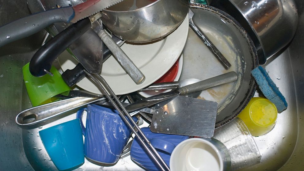 PHOTO: Dirty dishes fill the sink.