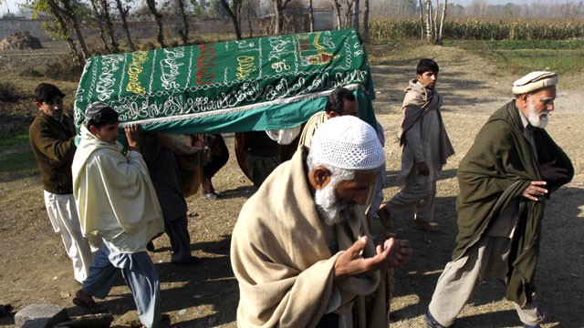 PHOTO: Mourners carry a coffin of a Pakistani charity worker, Jan. 2, 2013, who was killed with other colleagues during an attack by gunmen in Swabi. Seven charity workers were ambushed by gunmen on motorbikes as they were returning from a community centr