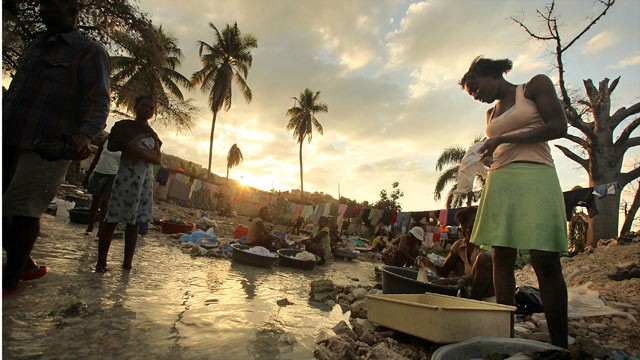 PHOTO: Haitians wash clothes in a stream Jan. 8, 2011 in Port-au-Prince, Haiti.