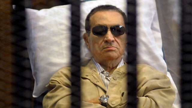 PHOTO: Ousted Egyptian president Hosni Mubarak sits inside a cage in a courtroom during his verdict hearing in Cairo, June 2, 2012. A judge sentenced Mubarak to life in prison after convicting him of involvement in the murder of protesters during the upri