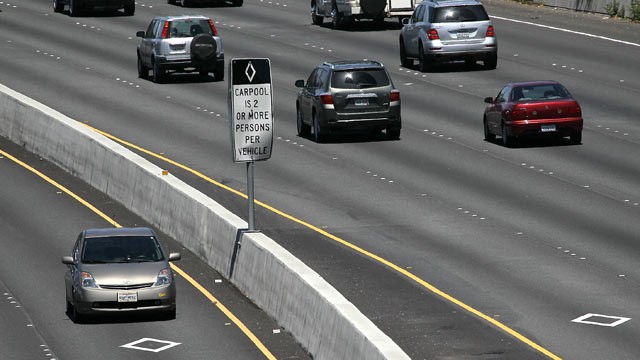 PHOTO: A Toyota Prius with a California "clean air vehicle" sticker drives in the carpool lane on highway 101, May 6, 2011 in San Rafael, Calif.