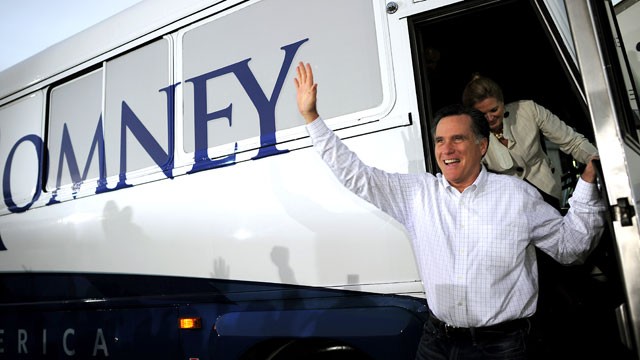 PHOTO: Republican presidential hopeful Mitt Romney exits his campaign bus greeting supporters at a campaign rally in Ormond Beach, Florida, Jan. 22, 2012.