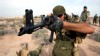 PHOTO: Iran's elite Revolutionary Guard special forces participate in military maneuvers at an undisclosed location near the Gulf.