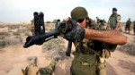 PHOTO: Iran's elite Revolutionary Guard special forces participate in military maneuvers at an undisclosed location near the Gulf.