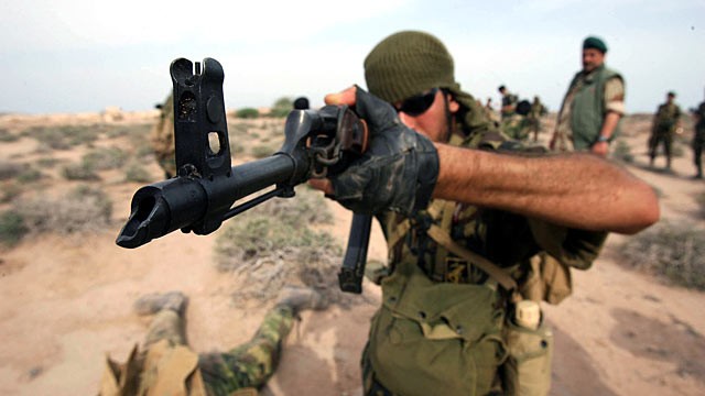 PHOTO: Iran's elite Revolutionary Guard special forces participate in military maneuvers at an undisclosed location near the Gulf.