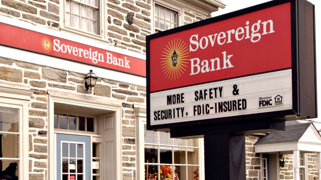 PHOTO: A sign for a Sovereign Bank branch stands in Oreland, Pennsylvania in this October 13, 2008 file photo.