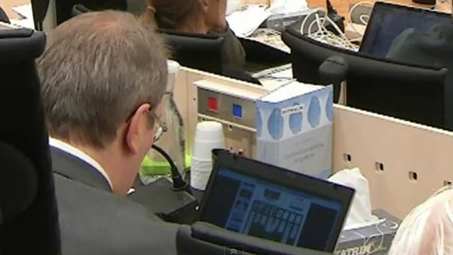 PHOTO: A camera captured a judge at the trial of Norway mass killer Anders Breivik playing solitaire on his computer during testimony.