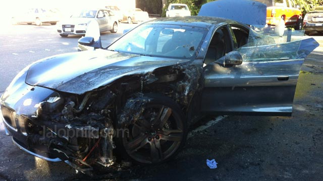 PHOTO: A Fisker Karma hybrid-electric luxury sedan set itself on fire as the owner was buying groceries.