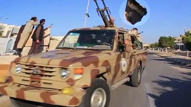 PHOTO: A new video purports to show al Qaeda flags flown by Libyan police and military vehicles in Sirte, Libya.