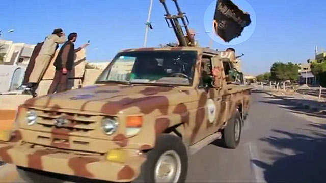 PHOTO: A new video purports to show al Qaeda flags flown by Libyan police and military vehicles in Sirte, Libya.