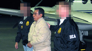 Mario Ernesto Villanueva Madrid is taken off a DEA jet in White Plains