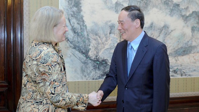 PHOTO: Chinese Vice Premier Wang Qishan (R) meets with Mary Schapiro, chair of the U.S. Securities and Exchange Commission (SEC), in Beijing, capital of China, July 2, 2012.