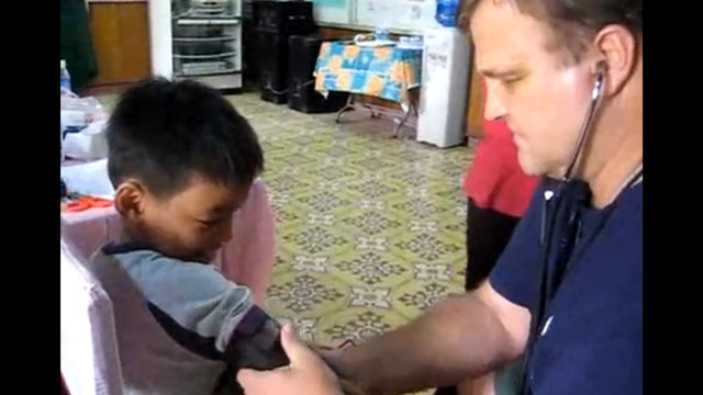 PHOTO: Gerald Flint, who posts videos of his relief efforts around the world on his website, was arrested in Indiana for allegedly impersonating an federal officer.