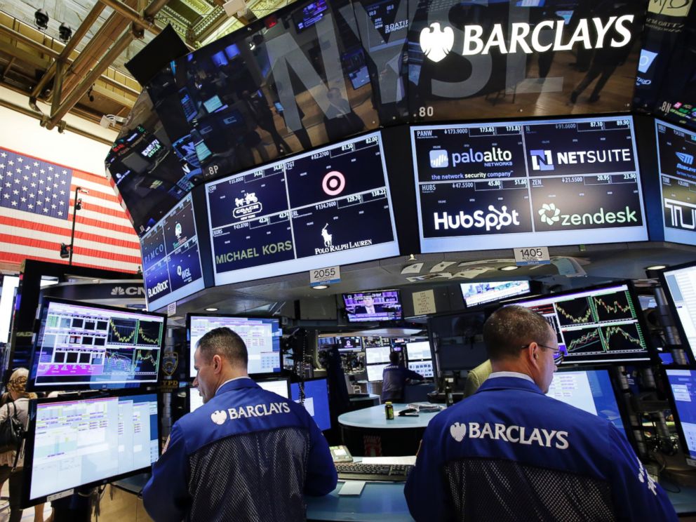 PHOTO: Traders with Barclays work at the New York Stock Exchange, July 6, 2015. World markets are trending downward following Greeces no vote in Sundays debt referendum.