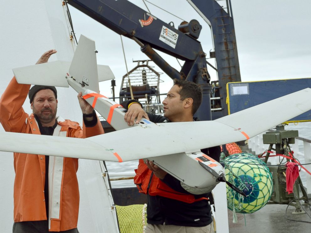 PHOTO: Shad Babb, left, and Armando Alvarado prepare to launch an unmanned aircraft from the deck of the Arctic Explorer, a commercial fishing boat, near Bishop Point on Unalaska Island, Alaska, in this June 14, 2011, file photo.