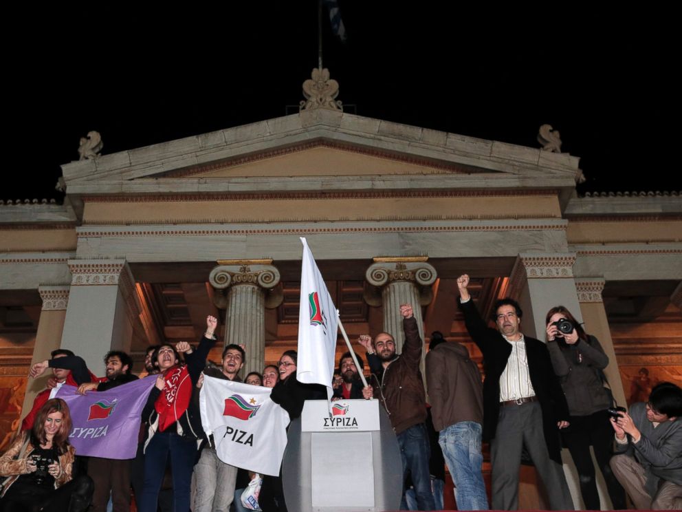 PHOTO: Supporters of the left-wing Syriza party Alexis Tsipras gather outside Athens University Headquarters, Jan. 25, 2015.